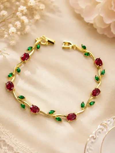 Pulsera rubí con hojas verdes dorada