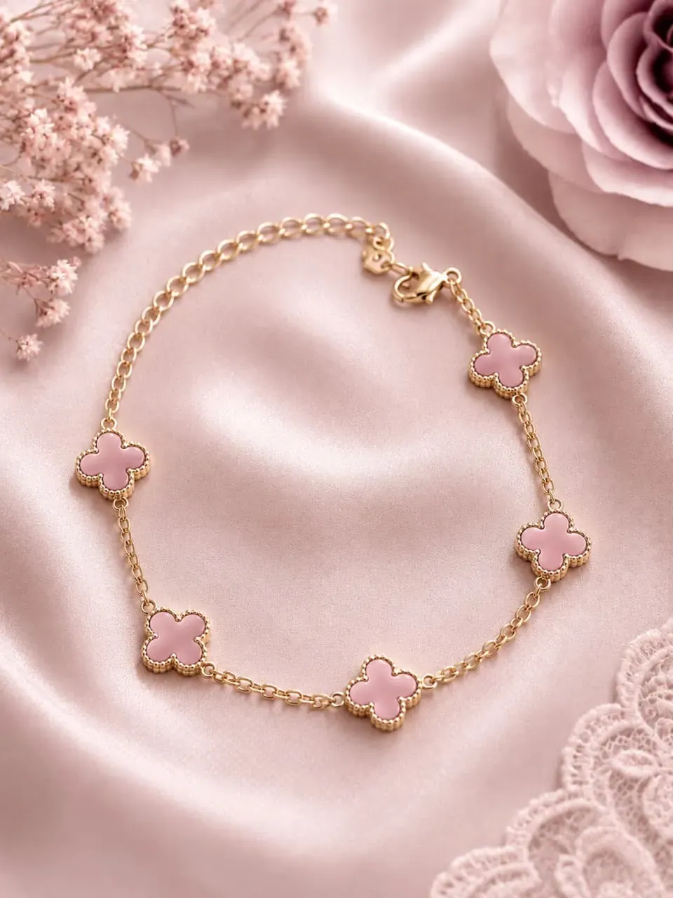 Pulsera trébol rosa dorada